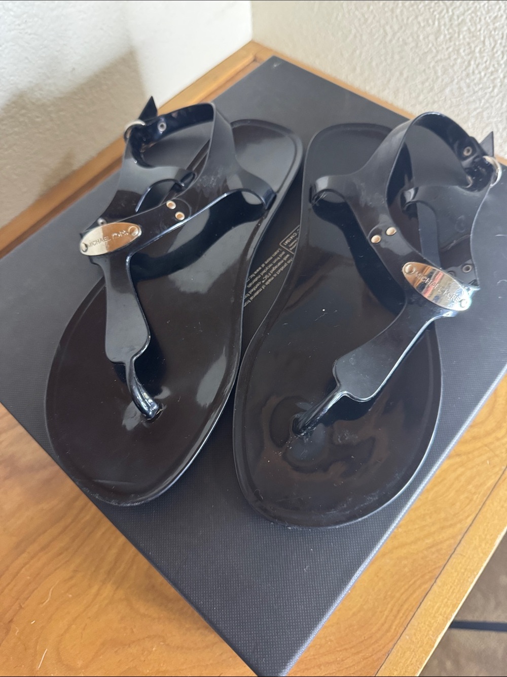 Michael Kors Black Gloss Jelly T-Strap Sandals with Gold Logo